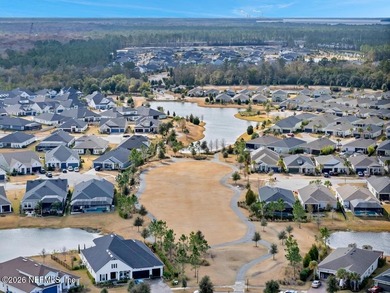 This perfectly maintained, low-maintenance townhome is ready for on Golf Club At South Hampton in Florida - for sale on GolfHomes.com, golf home, golf lot