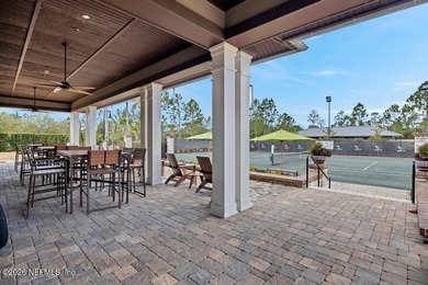This perfectly maintained, low-maintenance townhome is ready for on Golf Club At South Hampton in Florida - for sale on GolfHomes.com, golf home, golf lot