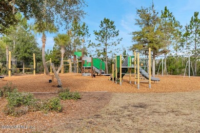 This perfectly maintained, low-maintenance townhome is ready for on Golf Club At South Hampton in Florida - for sale on GolfHomes.com, golf home, golf lot