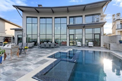 Discover the epitome of lakeside living at 402 Lighthouse Drive on Slick Rock Golf Course - Horseshoe Bay in Texas - for sale on GolfHomes.com, golf home, golf lot