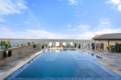 Discover the epitome of lakeside living at 402 Lighthouse Drive on Slick Rock Golf Course - Horseshoe Bay in Texas - for sale on GolfHomes.com, golf home, golf lot
