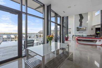 Discover the epitome of lakeside living at 402 Lighthouse Drive on Slick Rock Golf Course - Horseshoe Bay in Texas - for sale on GolfHomes.com, golf home, golf lot