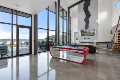 Discover the epitome of lakeside living at 402 Lighthouse Drive on Slick Rock Golf Course - Horseshoe Bay in Texas - for sale on GolfHomes.com, golf home, golf lot