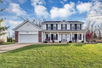 This beautiful 2-story w/finished lower level has an irrigated on Bear Creek Golf Club in Missouri - for sale on GolfHomes.com, golf home, golf lot