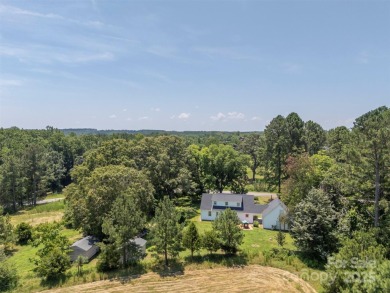 You don't want to miss this one!  It is a four bedroom two bath on Meadowbrook Golf Course in North Carolina - for sale on GolfHomes.com, golf home, golf lot