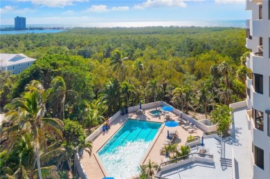 Experience the epitome of modern coastal luxury in this stunning on Club at Pelican Bay Golf Course in Florida - for sale on GolfHomes.com, golf home, golf lot