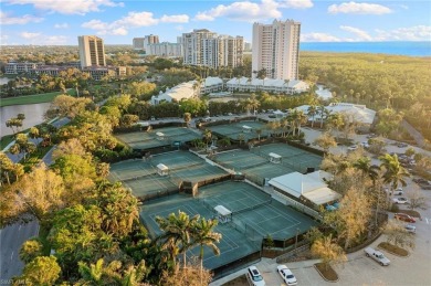 Experience the epitome of modern coastal luxury in this stunning on Club at Pelican Bay Golf Course in Florida - for sale on GolfHomes.com, golf home, golf lot