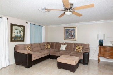 Experience peaceful pond-side living with stunning sunset views on Beacon Woods Golf Club in Florida - for sale on GolfHomes.com, golf home, golf lot