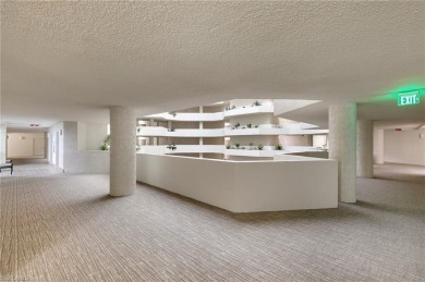 Experience the epitome of modern coastal luxury in this stunning on Club at Pelican Bay Golf Course in Florida - for sale on GolfHomes.com, golf home, golf lot