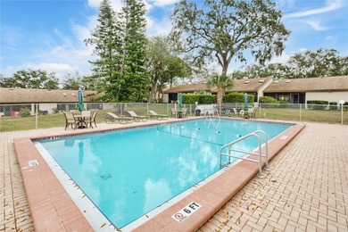 Welcome to Green Dolphin Villa Homes!  This comfortable 2 on Tarpon Springs Golf Course in Florida - for sale on GolfHomes.com, golf home, golf lot