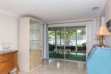 Experience peaceful pond-side living with stunning sunset views on Beacon Woods Golf Club in Florida - for sale on GolfHomes.com, golf home, golf lot
