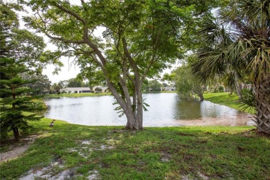 Experience peaceful pond-side living with stunning sunset views on Beacon Woods Golf Club in Florida - for sale on GolfHomes.com, golf home, golf lot