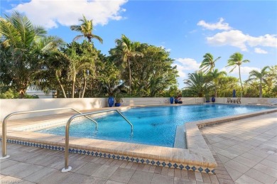 Experience the epitome of modern coastal luxury in this stunning on Club at Pelican Bay Golf Course in Florida - for sale on GolfHomes.com, golf home, golf lot