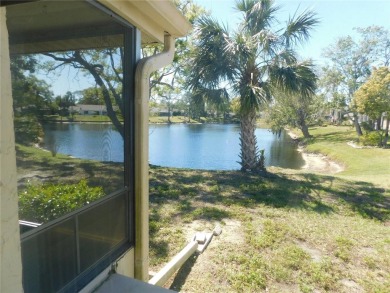 Experience peaceful pond-side living with stunning sunset views on Beacon Woods Golf Club in Florida - for sale on GolfHomes.com, golf home, golf lot