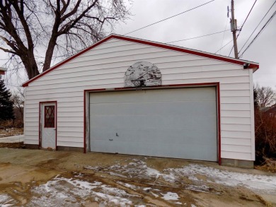 This two~story home is located in a low~traffic area of on Floyd Park Golf Course in Iowa - for sale on GolfHomes.com, golf home, golf lot