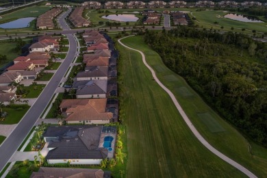 WELCOME to pure ELEGANCE in the highly sought after Lakewood on Lakewood National Golf Club in Florida - for sale on GolfHomes.com, golf home, golf lot