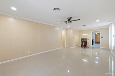 Nestled in the coveted Harlingen Country Club community, this on Harlingen Country Club in Texas - for sale on GolfHomes.com, golf home, golf lot