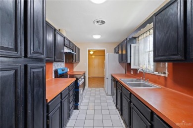 Nestled in the coveted Harlingen Country Club community, this on Harlingen Country Club in Texas - for sale on GolfHomes.com, golf home, golf lot