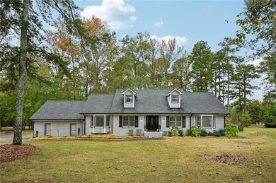 Experience resort-style living every day in this all-brick on Fairfield Plantation Golf and Country Club in Georgia - for sale on GolfHomes.com, golf home, golf lot