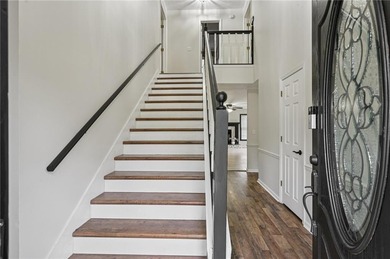 Experience resort-style living every day in this all-brick on Fairfield Plantation Golf and Country Club in Georgia - for sale on GolfHomes.com, golf home, golf lot