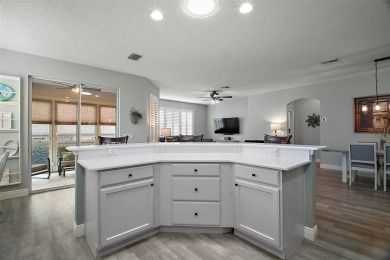 BOND PAID! STUNNING TURNKEY SOMERSET MODEL WITH GOLF CART on Mallory Hill Golf and Country Club in Florida - for sale on GolfHomes.com, golf home, golf lot