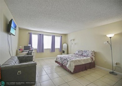 Experience this beautiful and huge 1 bed/ 1 bath *SECOND-FLOOR* on Country Club of Miami in Florida - for sale on GolfHomes.com, golf home, golf lot