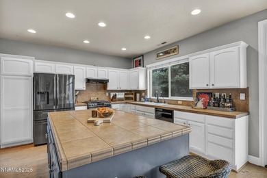 Discover this stunning home at 2477 Watercrest Court, nestled at on Silver Oak Golf Course in Nevada - for sale on GolfHomes.com, golf home, golf lot