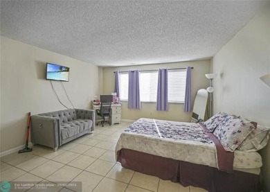 Experience this beautiful and huge 1 bed/ 1 bath *SECOND-FLOOR* on Country Club of Miami in Florida - for sale on GolfHomes.com, golf home, golf lot