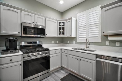 BOND PAID! STUNNING TURNKEY SOMERSET MODEL WITH GOLF CART on Mallory Hill Golf and Country Club in Florida - for sale on GolfHomes.com, golf home, golf lot
