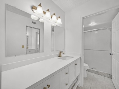 Rarely Available First Floor End Unit with views of the 7th hole on The Golf Club of Jupiter in Florida - for sale on GolfHomes.com, golf home, golf lot