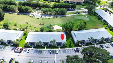 Rarely Available First Floor End Unit with views of the 7th hole on The Golf Club of Jupiter in Florida - for sale on GolfHomes.com, golf home, golf lot