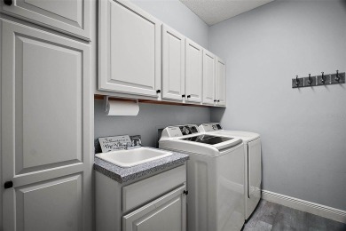 BOND PAID! STUNNING TURNKEY SOMERSET MODEL WITH GOLF CART on Mallory Hill Golf and Country Club in Florida - for sale on GolfHomes.com, golf home, golf lot