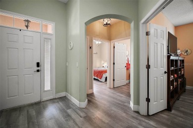 BOND PAID! STUNNING TURNKEY SOMERSET MODEL WITH GOLF CART on Mallory Hill Golf and Country Club in Florida - for sale on GolfHomes.com, golf home, golf lot