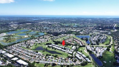 Rarely Available First Floor End Unit with views of the 7th hole on The Golf Club of Jupiter in Florida - for sale on GolfHomes.com, golf home, golf lot