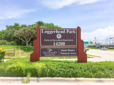 Rarely Available First Floor End Unit with views of the 7th hole on The Golf Club of Jupiter in Florida - for sale on GolfHomes.com, golf home, golf lot