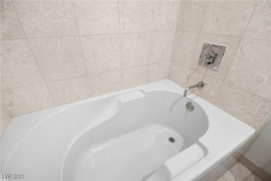 This turn-key, corner unit in the Turnberry Towers embodies Las on Las Vegas Country Club in Nevada - for sale on GolfHomes.com, golf home, golf lot