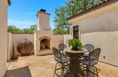 Discover this charming Hill Country Spanish-style Casita on Apple Rock Golf Course - Horseshoe Bay in Texas - for sale on GolfHomes.com, golf home, golf lot