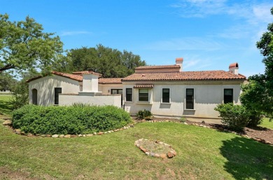 Discover this charming Hill Country Spanish-style Casita on Apple Rock Golf Course - Horseshoe Bay in Texas - for sale on GolfHomes.com, golf home, golf lot