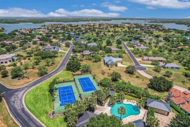 Discover this charming Hill Country Spanish-style Casita on Apple Rock Golf Course - Horseshoe Bay in Texas - for sale on GolfHomes.com, golf home, golf lot