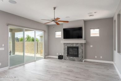 Stunning home located on the Quailwood golf course. This home on Quail Wood Greens Golf Course in Arizona - for sale on GolfHomes.com, golf home, golf lot