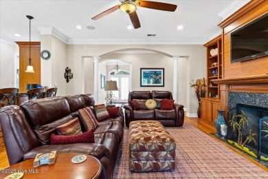 Discover Coastal Elegance at 7403 Haddington Place in Ocean on Sea Trail Golf Resort in North Carolina - for sale on GolfHomes.com, golf home, golf lot