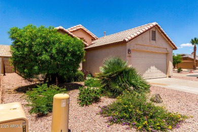 Tucked away in a charming cul-de-sac, this delightful 2-bedroom on Coyote Lakes Golf Club in Arizona - for sale on GolfHomes.com, golf home, golf lot