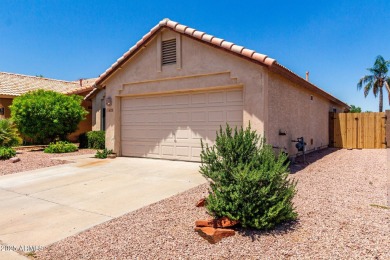 Tucked away in a charming cul-de-sac, this delightful 2-bedroom on Coyote Lakes Golf Club in Arizona - for sale on GolfHomes.com, golf home, golf lot
