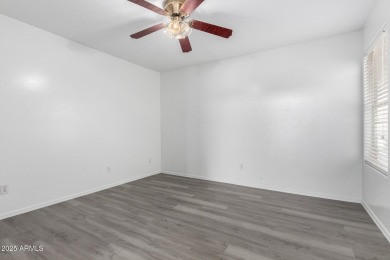 Tucked away in a charming cul-de-sac, this delightful 2-bedroom on Coyote Lakes Golf Club in Arizona - for sale on GolfHomes.com, golf home, golf lot