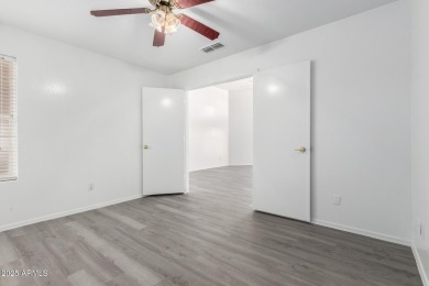 Tucked away in a charming cul-de-sac, this delightful 2-bedroom on Coyote Lakes Golf Club in Arizona - for sale on GolfHomes.com, golf home, golf lot