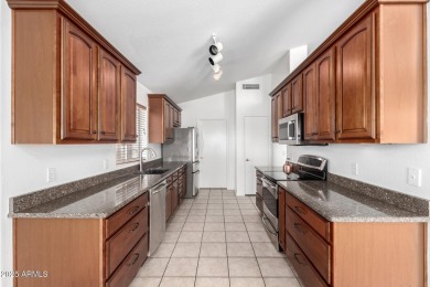 Tucked away in a charming cul-de-sac, this delightful 2-bedroom on Coyote Lakes Golf Club in Arizona - for sale on GolfHomes.com, golf home, golf lot