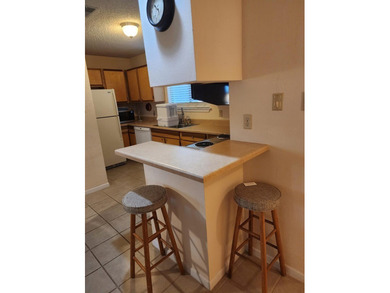 Turnkey downstairs unit in Rockport Country Club - fully on Rockport Country Club in Texas - for sale on GolfHomes.com, golf home, golf lot