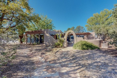 Check out this Unique Adobe style home on a corner lot in the on Tierra Del Sol Golf Course in New Mexico - for sale on GolfHomes.com, golf home, golf lot