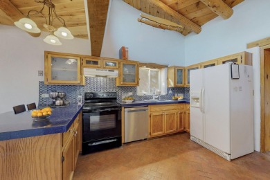 Check out this Unique Adobe style home on a corner lot in the on Tierra Del Sol Golf Course in New Mexico - for sale on GolfHomes.com, golf home, golf lot