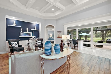 4/3 Custom Former Model Home in Harbor Hills Golf & CC(R), Lady on Harbor Hills Country Club in Florida - for sale on GolfHomes.com, golf home, golf lot